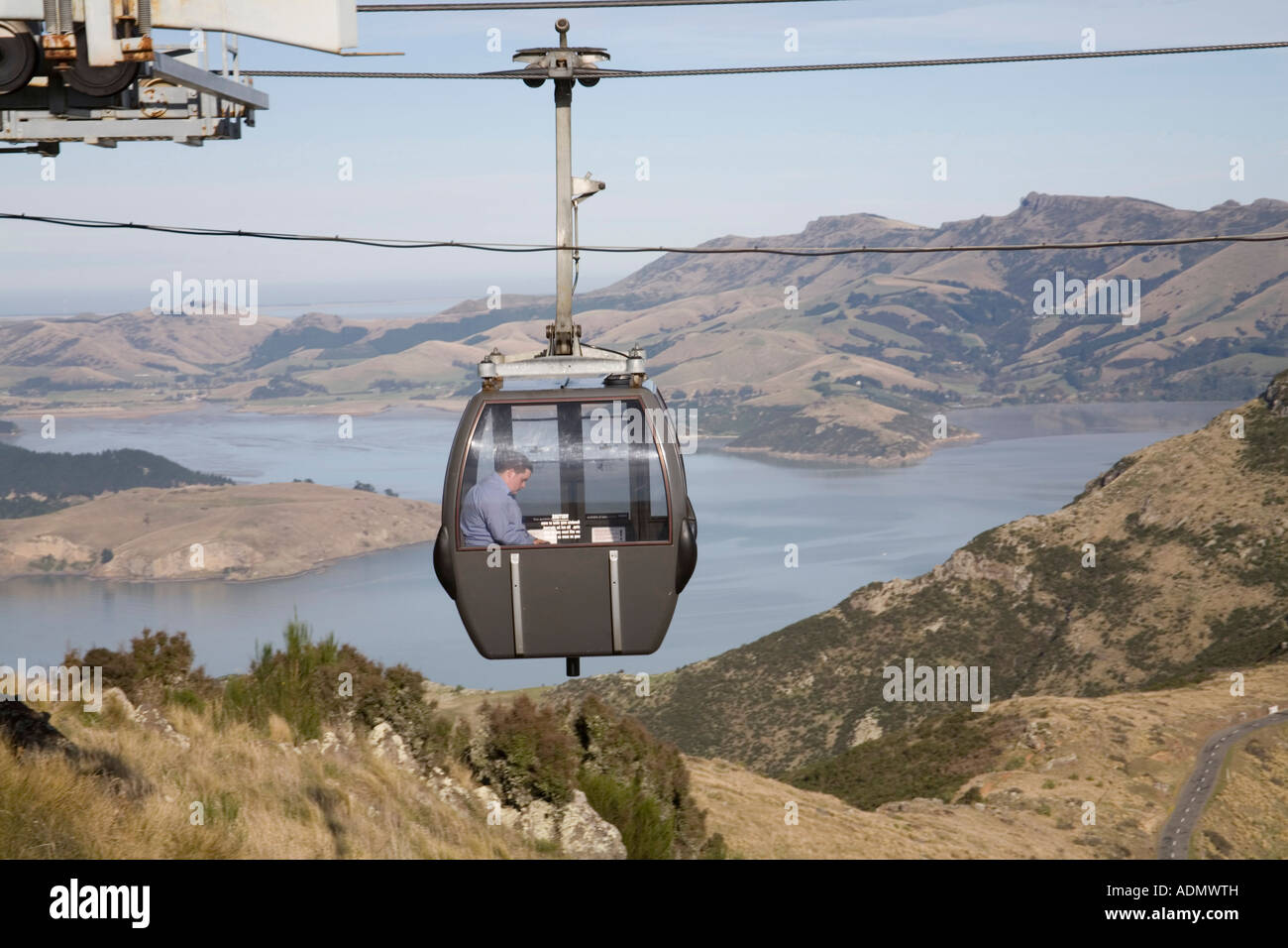 CHRISTCHURCH SOUTH ISLAND NEW ZEALAND May A young man in a cable car descending Mount Cavenish Gondola to the base Station Stock Photo