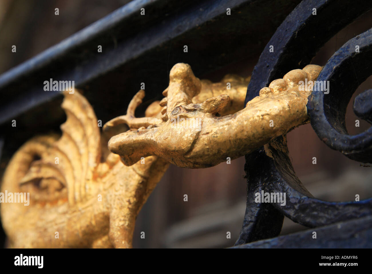 Dragon on ornate gateway, Kings College Cambridge Stock Photo