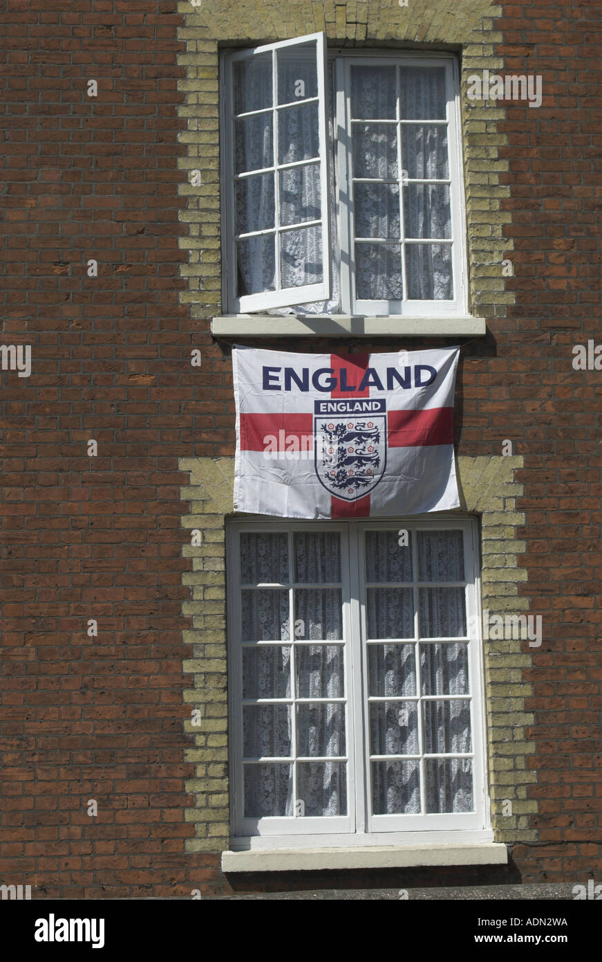 House draped with England flag London UK Stock Photo