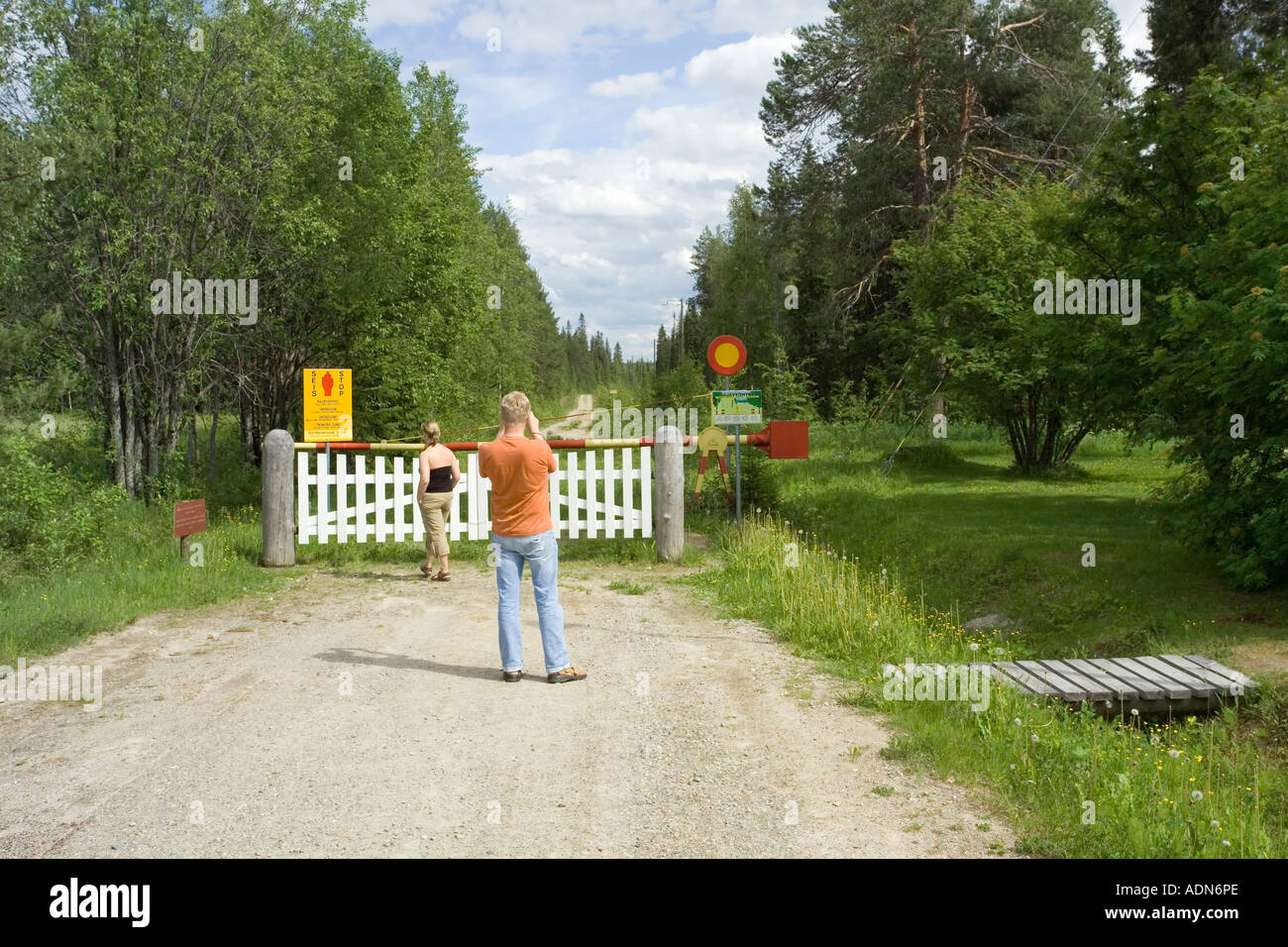 Tourists at the Frontier zone, Raate road, Finland Stock Photo