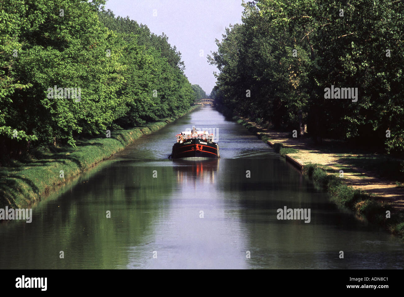 France, Southwest. Near Montech. Beautiful French barge Nuance on the Canal du Midi here called Canal Lateral a la Garonne. Stock Photo