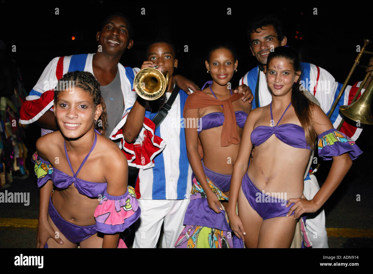 Young women in skimpy costumes at Carnival Havana Cuba with musicians Stock Photo