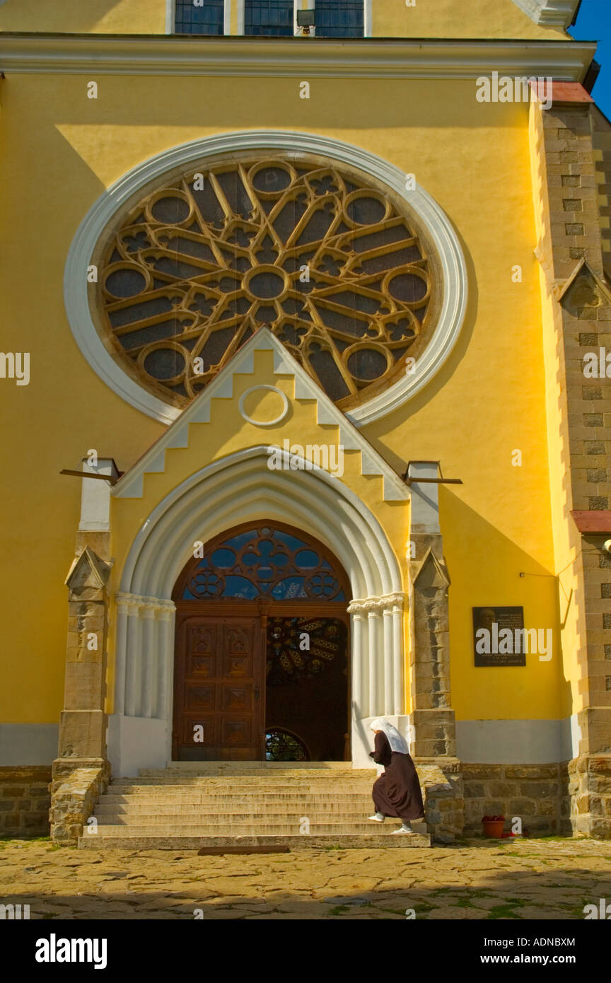 Nun entering church on top of Marianska Hora in Levoca eastern Slovakia EU Stock Photo