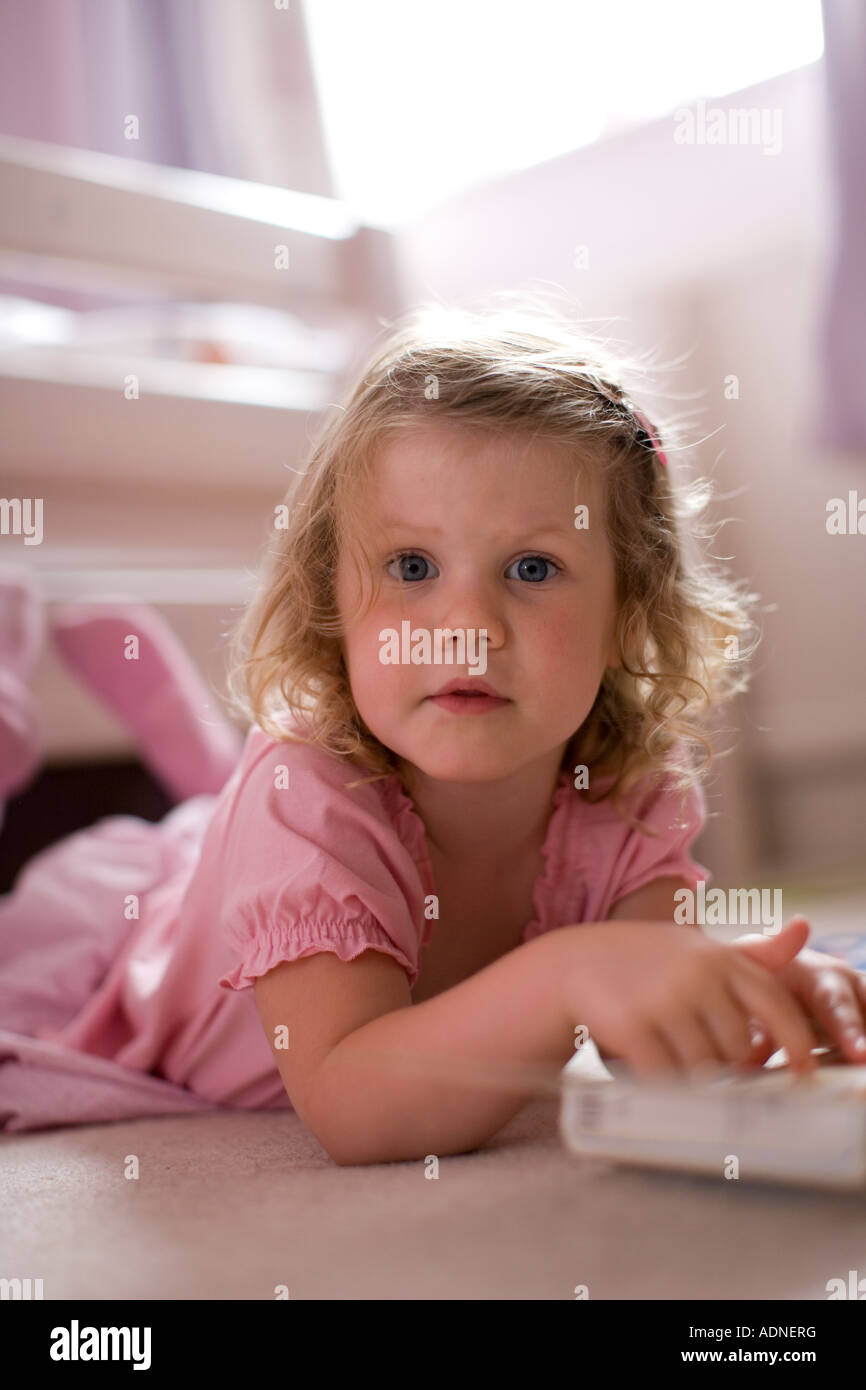 Toddler learning to read Stock Photo