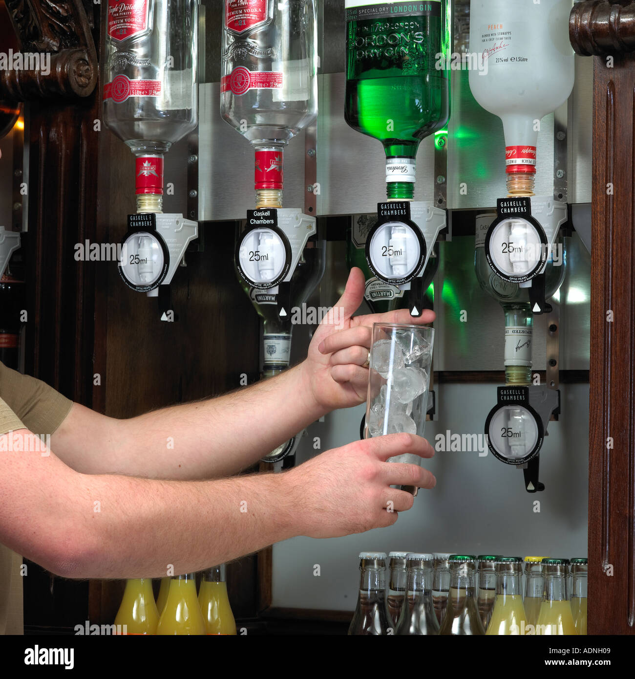 Landlord using bar optics Stock Photo Alamy