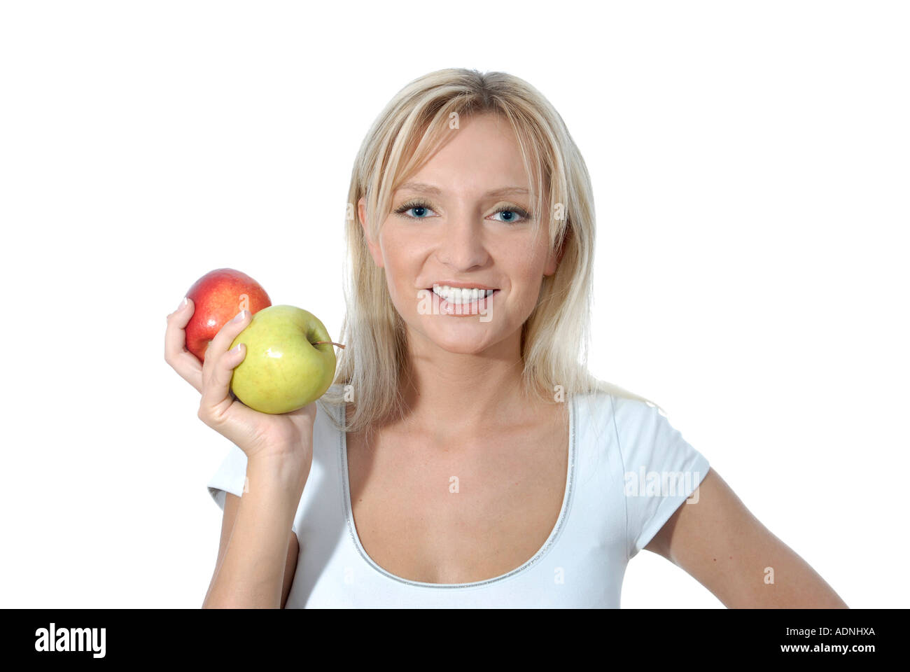 Junge Frau blond lacht laechelt freundlich positiv Aepfel Apfel rot gruen Obst gesund Vitamine Stock Photo