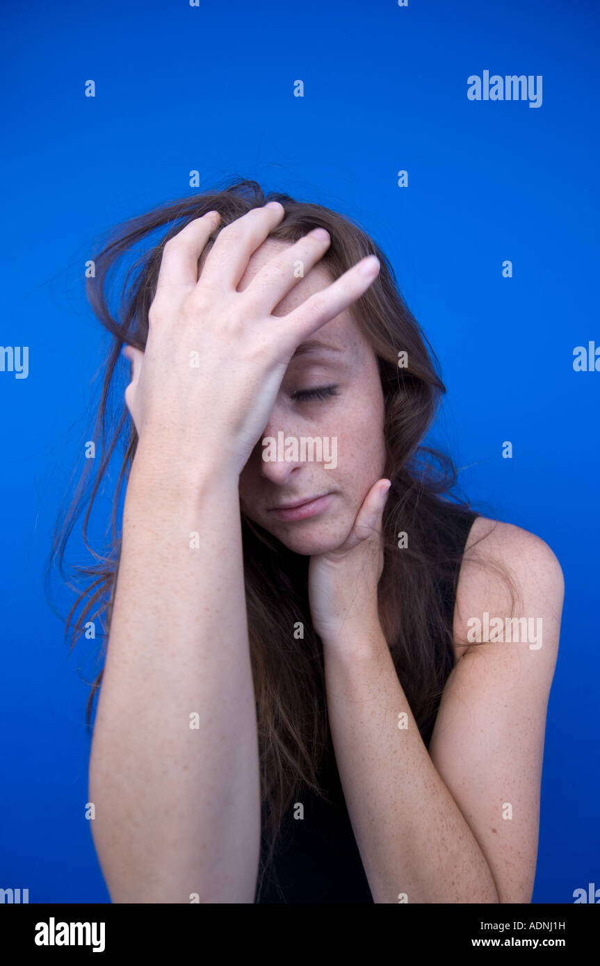 worried stressed hungover anxious red haired redhead freckle face woman
