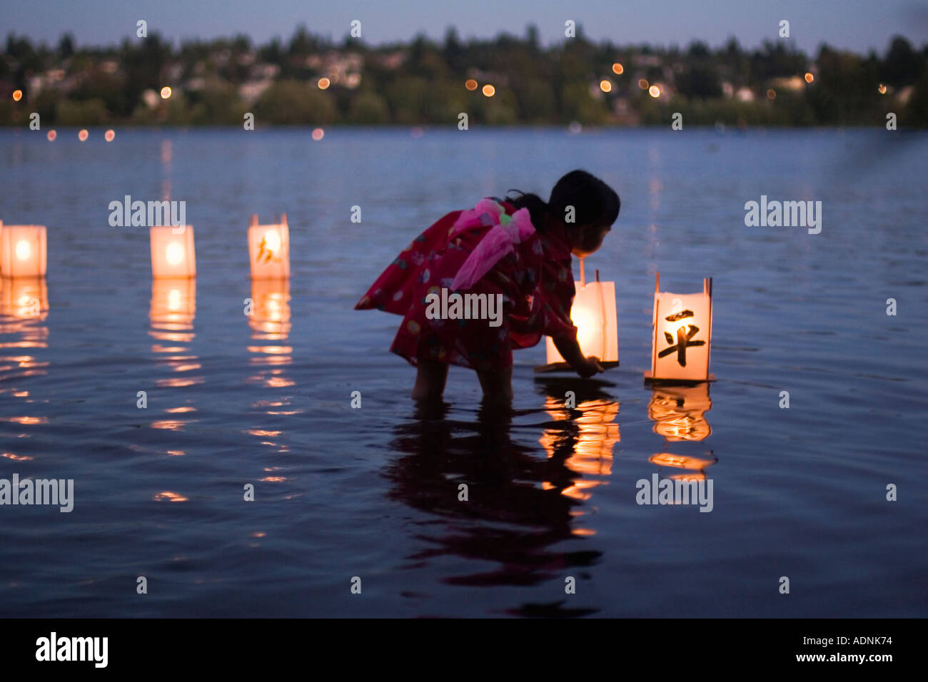 Toro Nagashi lantern floating ceremony in remembrance of the victims of the bombings of Hiroshima and Nagasaki Japan Seattle WA Stock Photo