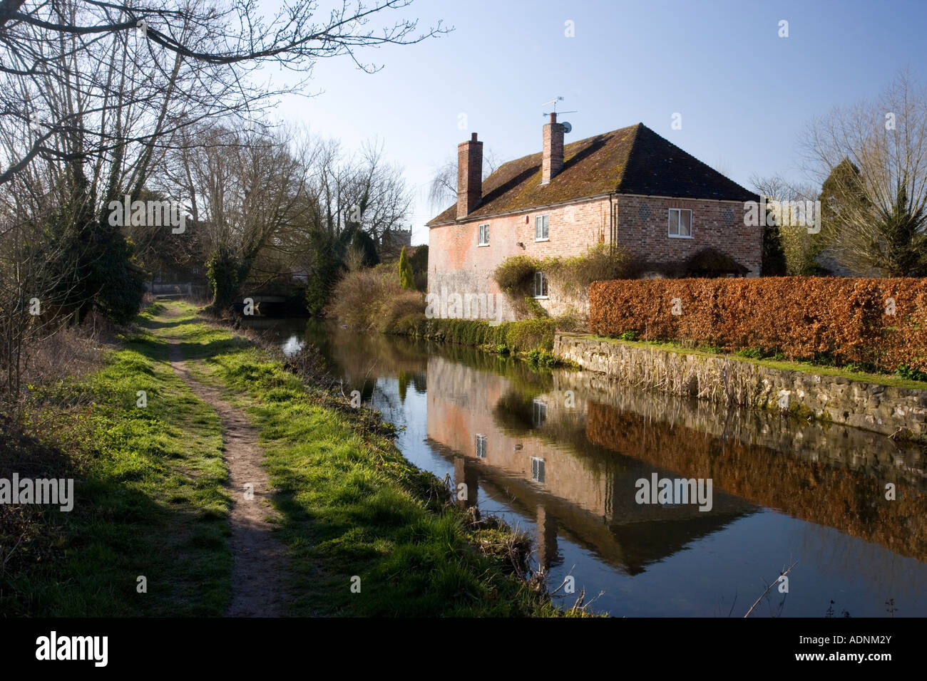 The River Wylye at Steeple Langford with riverside towpath Early