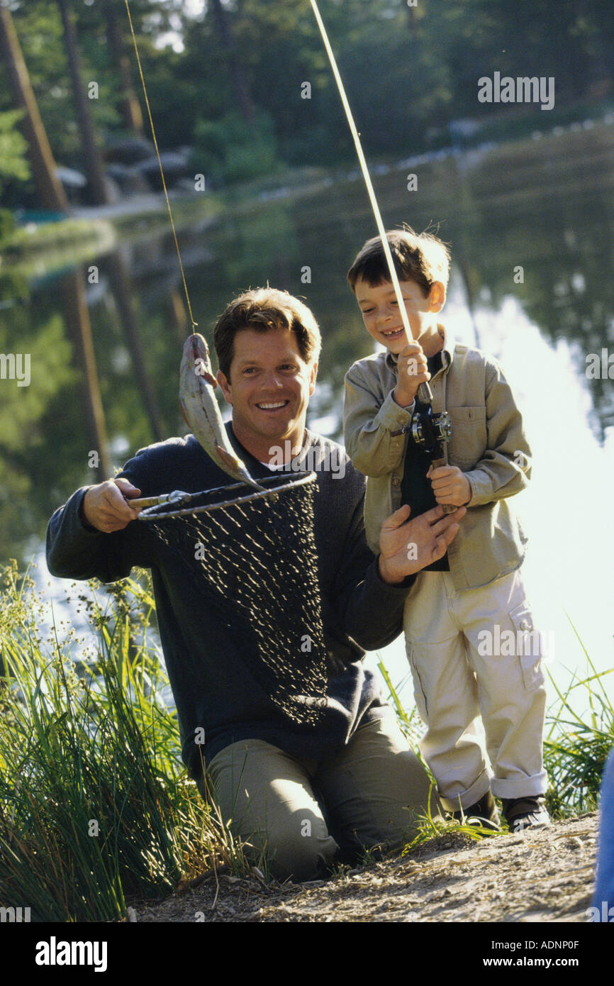 Father and his son fishing Stock Photo - Alamy