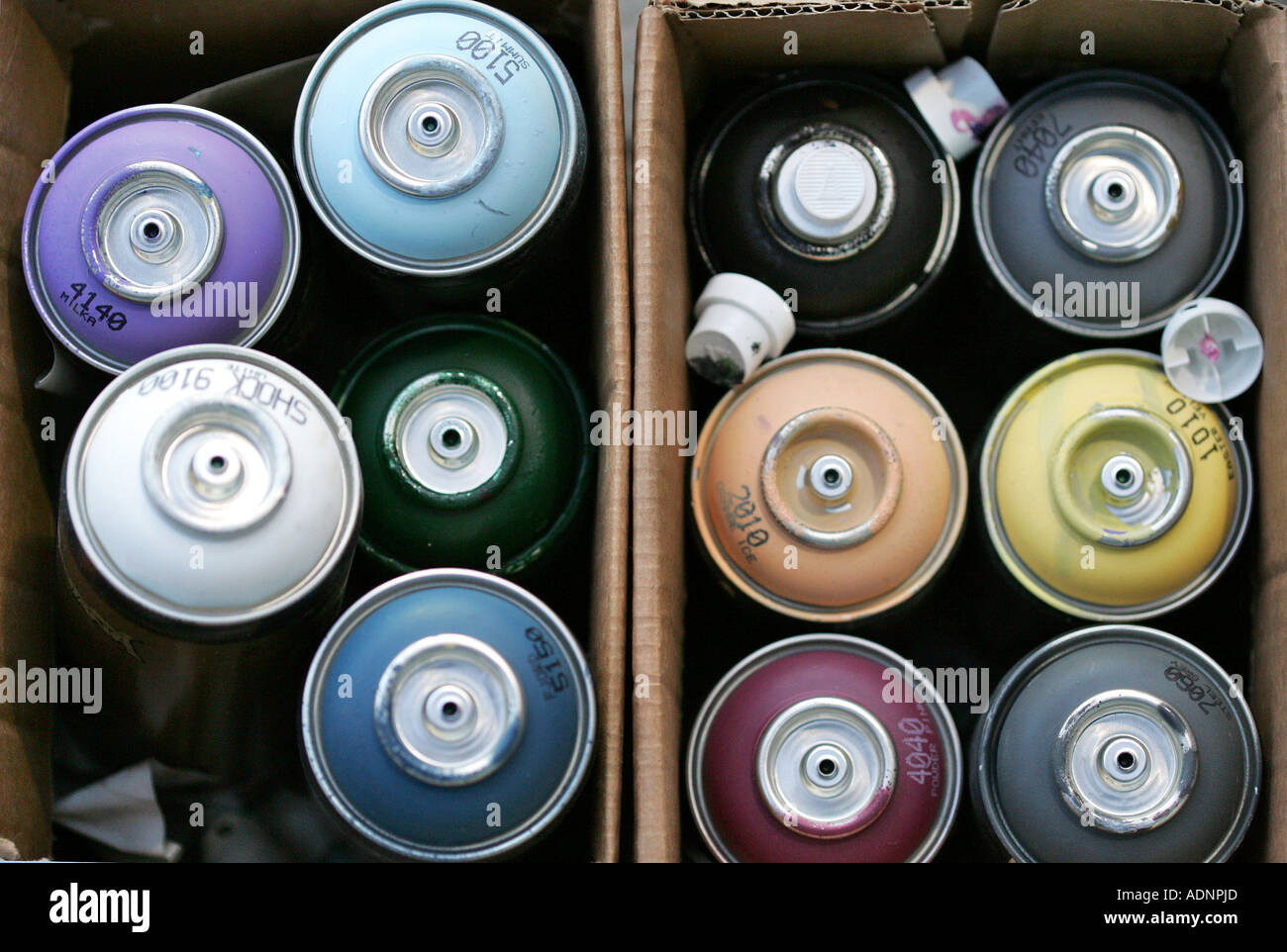 Paint spray cans of different colours Stock Photo Alamy