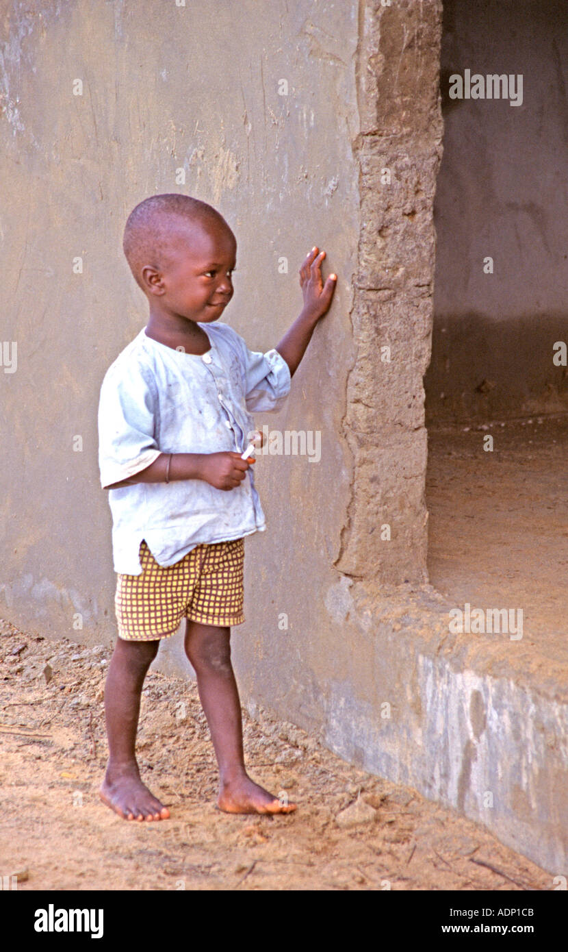 Gambian Boy with Lollipop Stock Photo