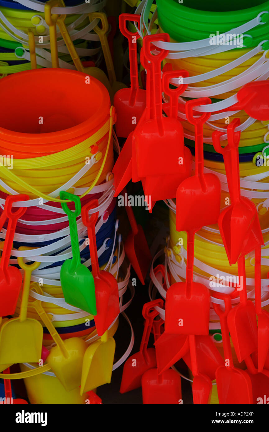 beach toy pails and shovels stacked up at a shop Stock Photo Alamy