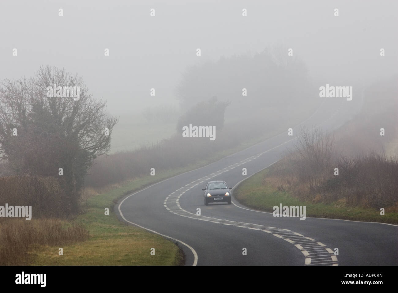 Foggy road hi-res stock photography and images - Alamy
