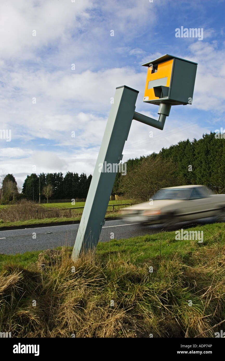 Traffic passes vandalised Gatso speed camera on A40 Oxfordshire England United Kingdom Stock Photo