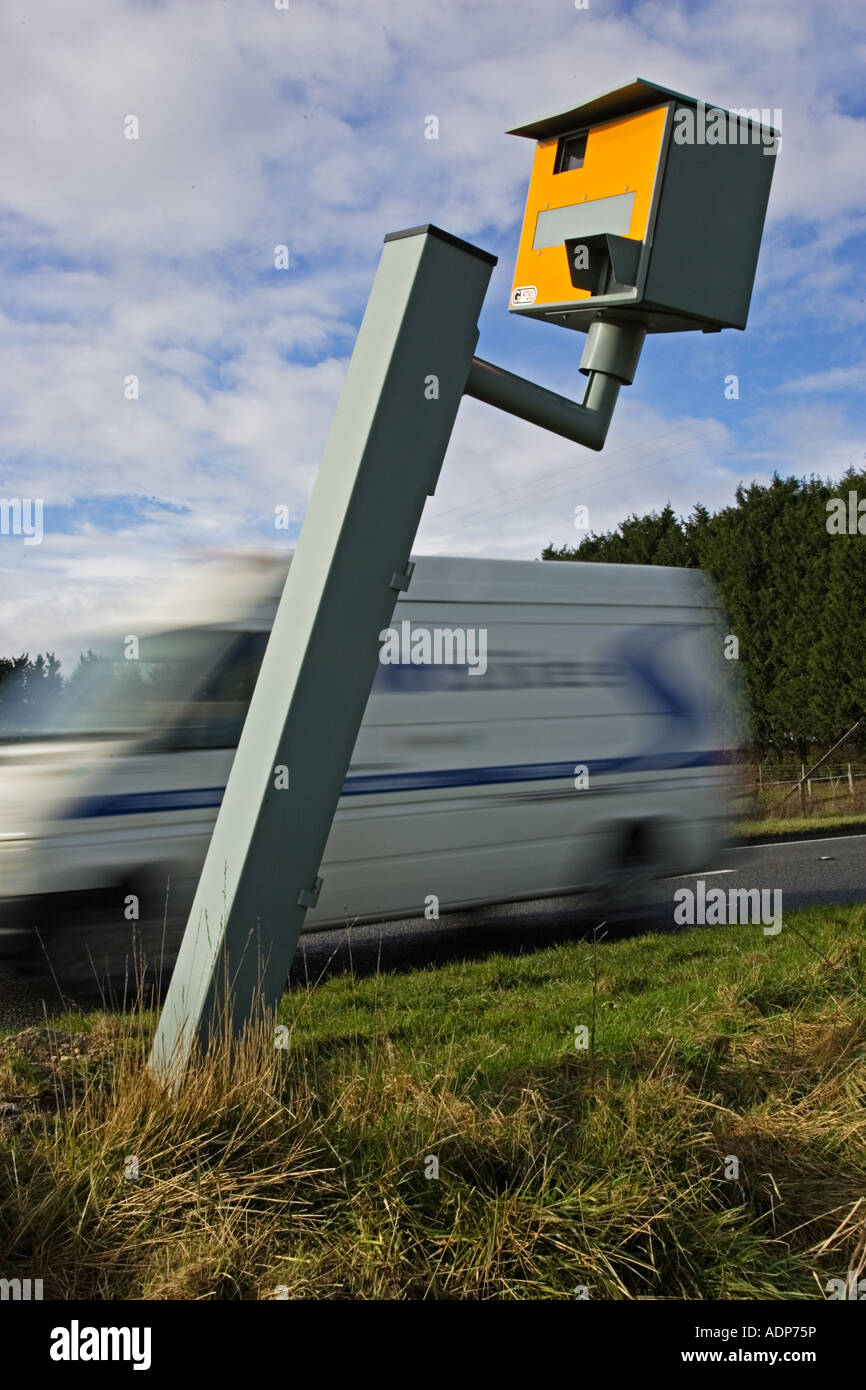 Traffic passes vandalised Gatso speed camera on A40 Oxfordshire England United Kingdom Stock Photo