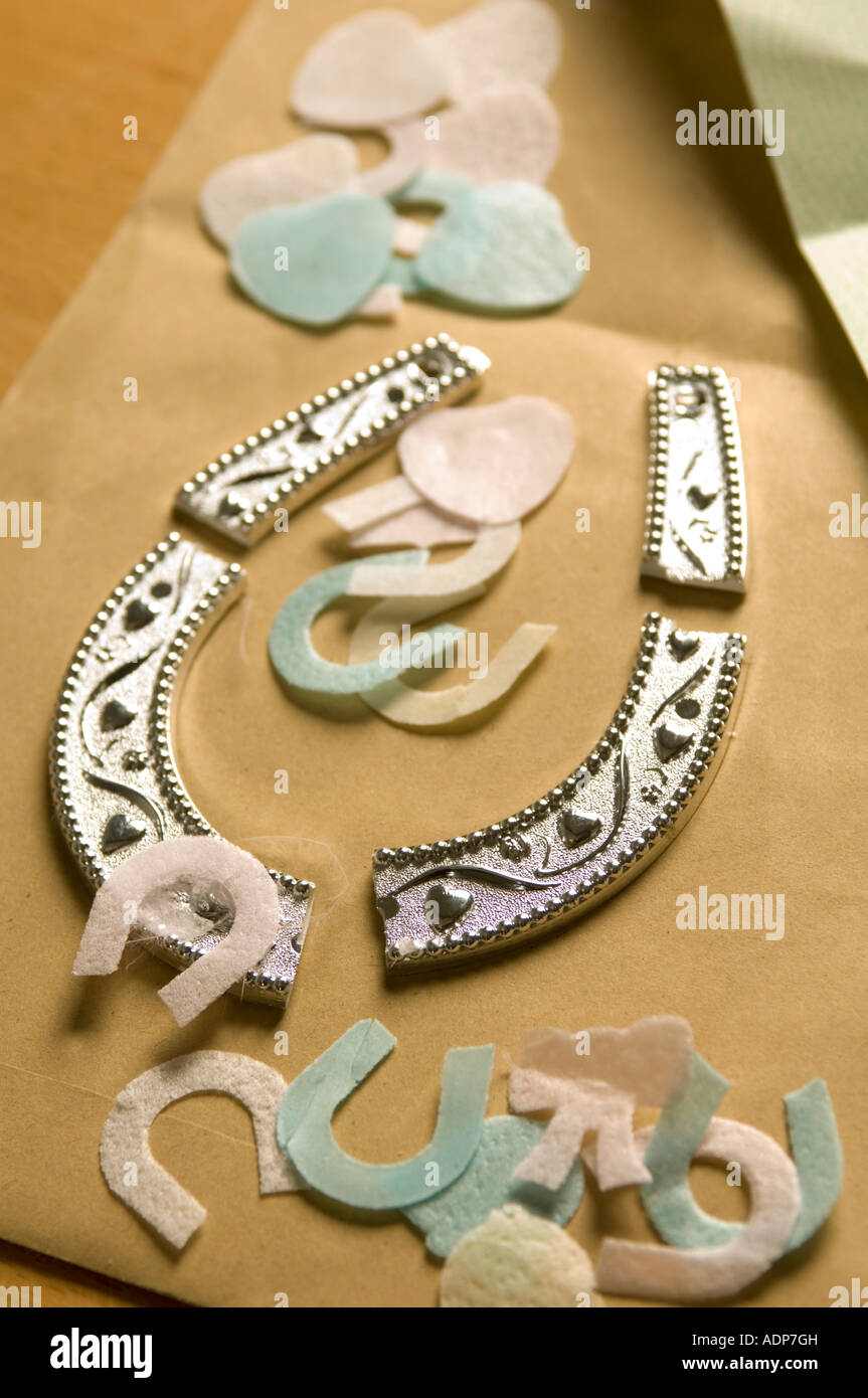 a broken wedding horseshoe and with confetti Stock Photo Alamy