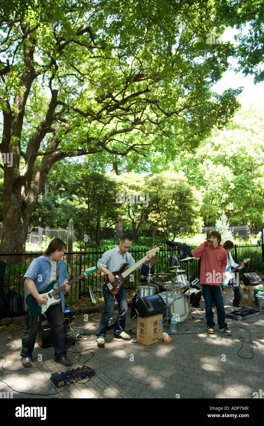 band playing music in Yoyogi koen park Tokyo Japan Asia Stock Photo