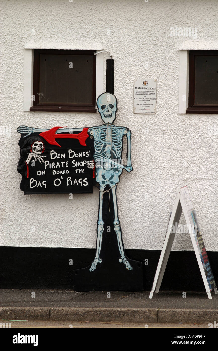 Skeleton direction sign for Pirate boat, Penzance Cornwall UK Stock Photo