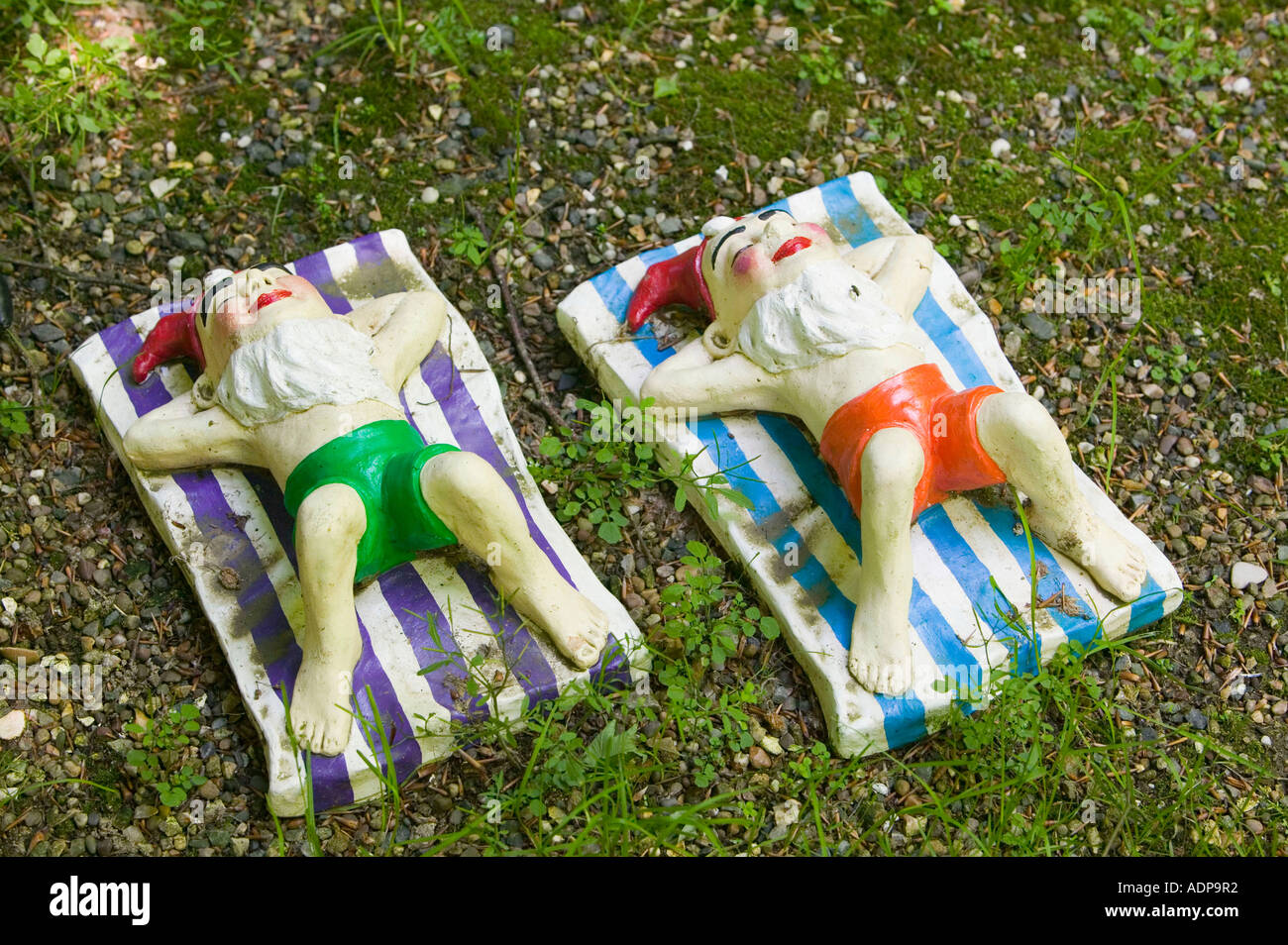 sunbathing Gnomes at theWest Putnam gnome reserve, Devon, UK Stock Photo