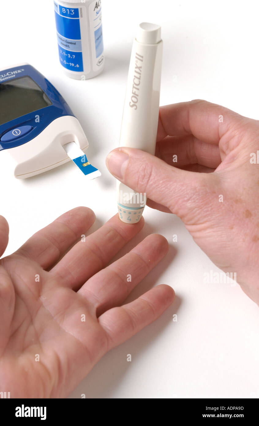 Testing blood sugar Stock Photo Alamy