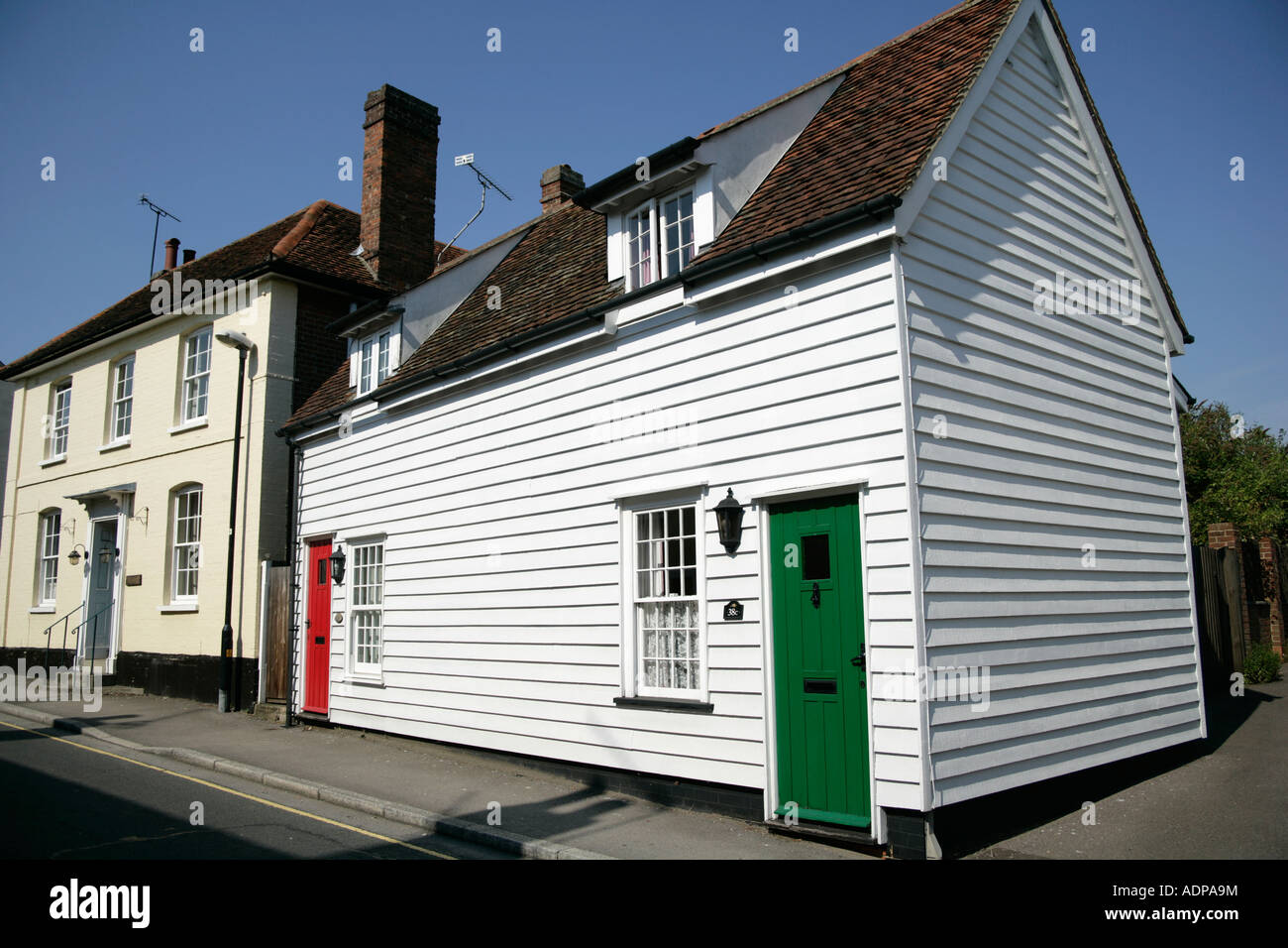 White painted weather boarding on a house Coggeshall Essex East Anglia