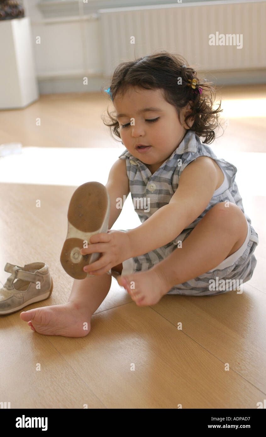Toddler Putting On Shoes