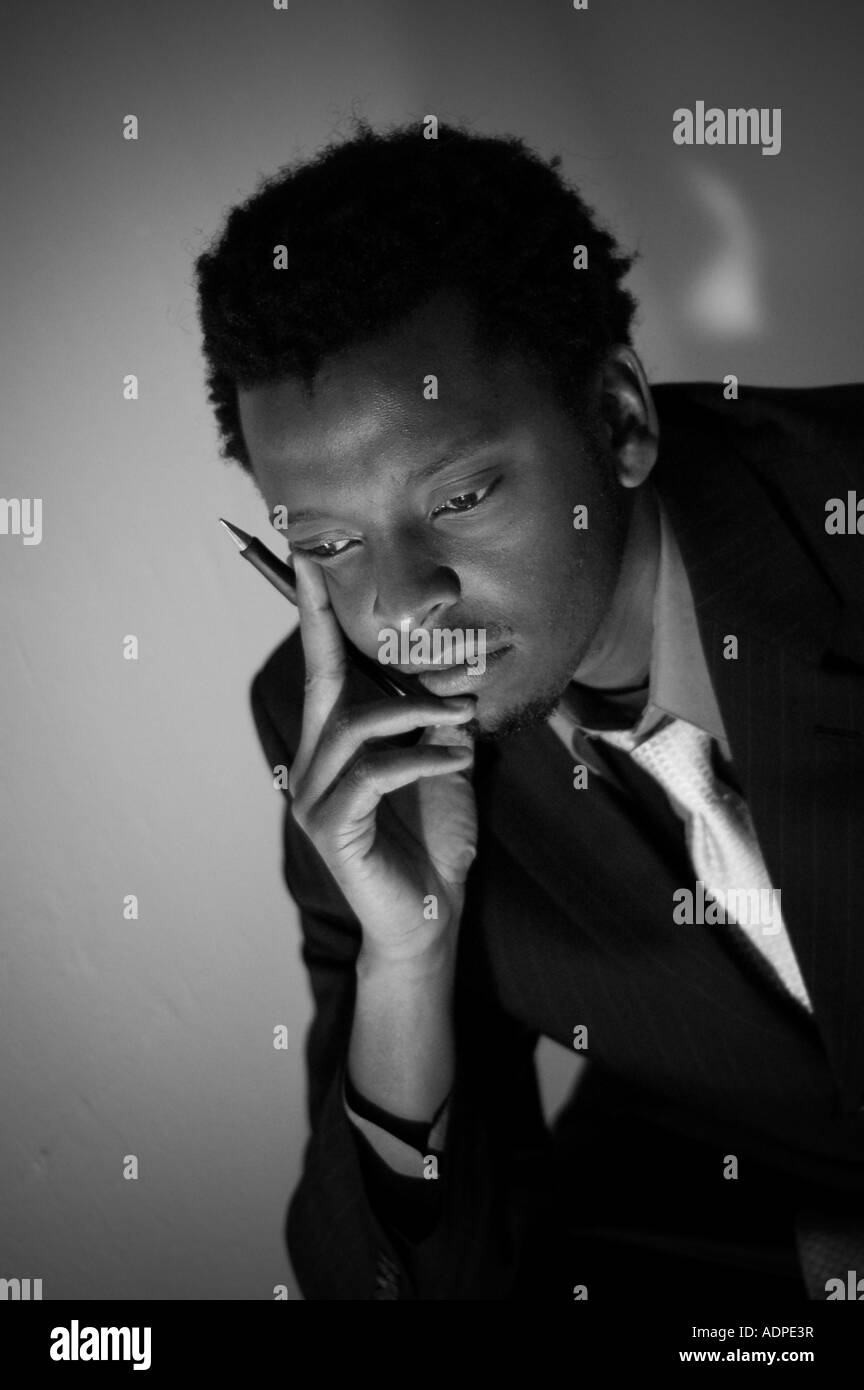 A black and white portrait of a young man in a suit and tie Stock Photo ...