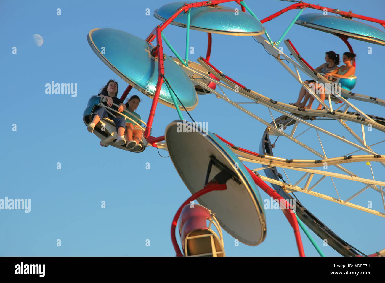 Paratrooper Carnival Ride Greene County Ohio Fair Moon is visible in