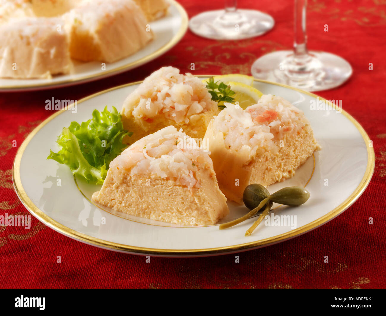 Crab mousse made into a ring and cut in a party buffet setting Stock Photo