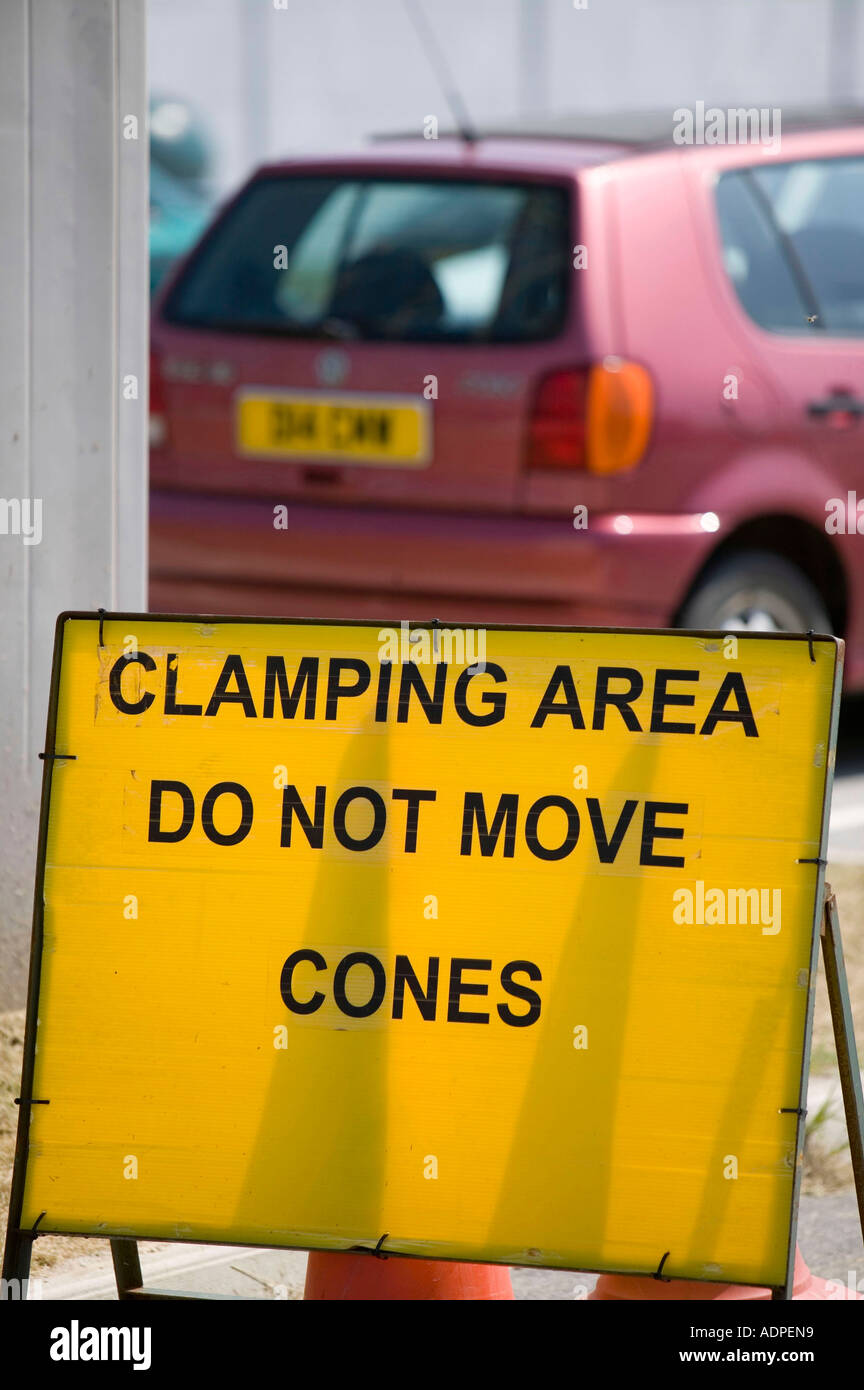 sign warning of a clamping zone at Newquay airport, Cornwall, UK Stock