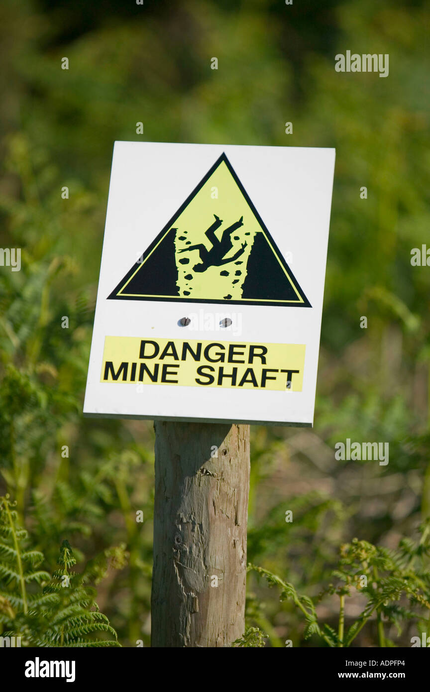 sign warning of an old mine shaft on bodmin moor, Cornwall, UK Stock Photo