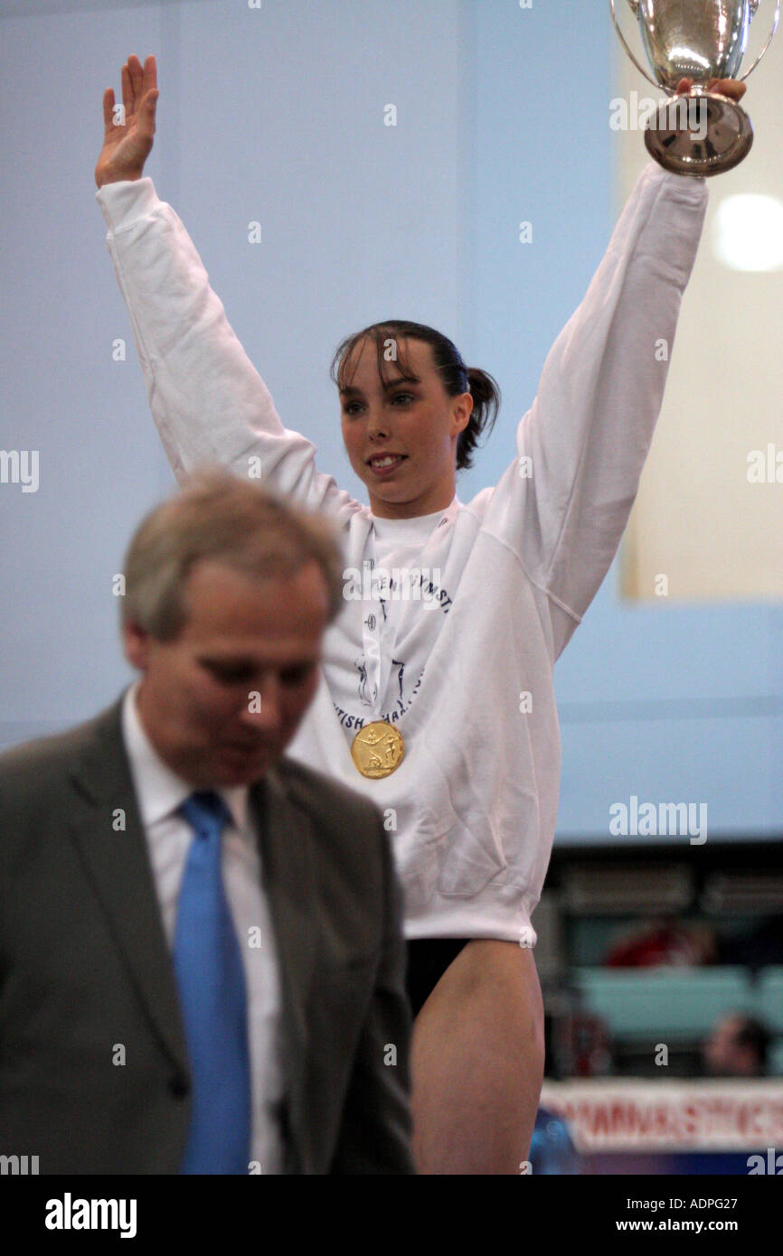 elizabeth tweddle top female gymnast receiving gold award from Brian
