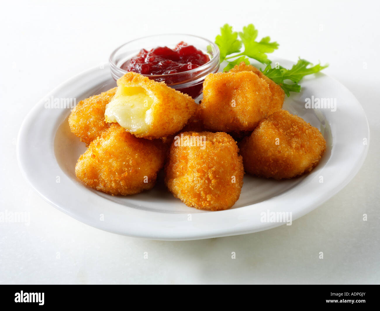 Deep fried Camembert with cranberry sauce Stock Photo