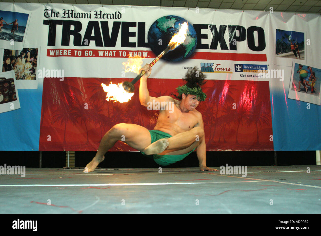 Miami Florida,Coconut Grove,Convention Center,centre,Miami Herald travel  traveling Expo,adult adults man men male,Polynesian fire  dancer,stage,danger Stock Photo - Alamy