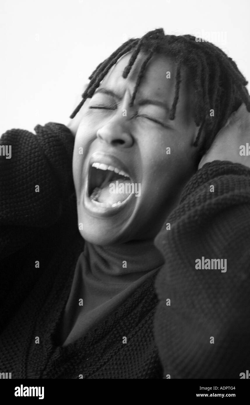 Woman and covering eyes and upset Black and White Stock Photos & Images