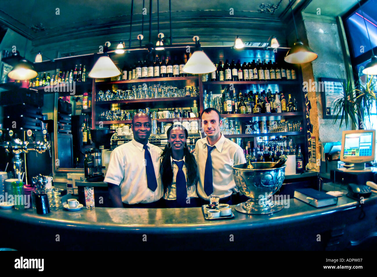 PARIS France, Male Female Waiters Behind Bar in French Bistro Restaurant, 'Le Grizzli' Café Portrait Pub Stock Photo