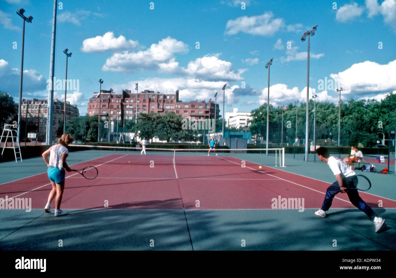Paris FRANCE, Urban Parks, 2 Couples Playing Tennis in 'Porte d'Orleans' Sports Stock Photo