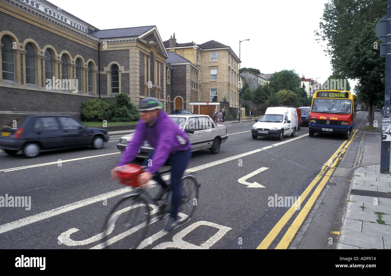 Cyclist in bus cycle lane in gloucester road Bristol england Stock Photo