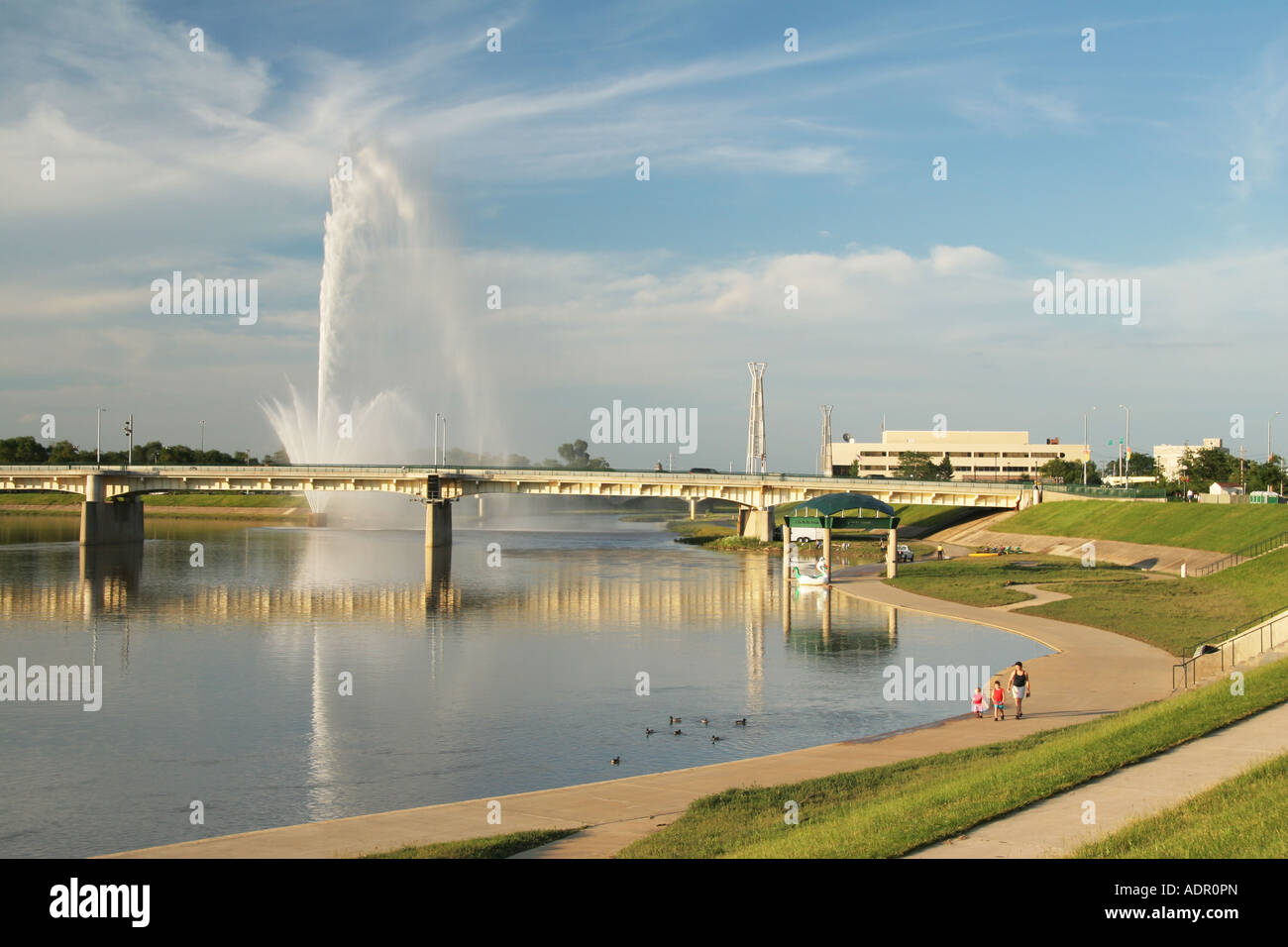 Water Fountain on River in Dayton Ohio Great Miami River and Mad Stock