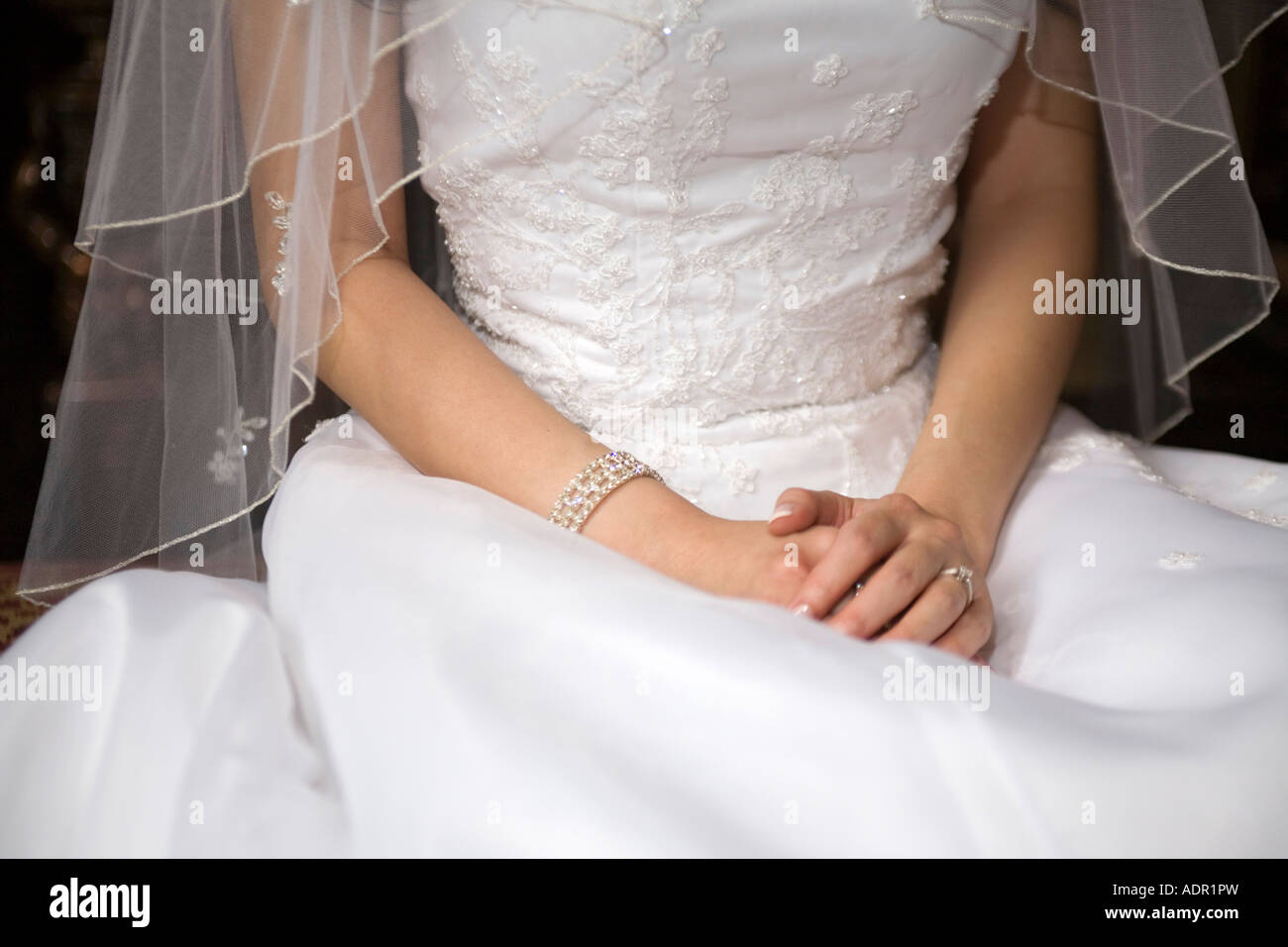 Detail shot of a traditionally dressed bride's hands Stock Photo - Alamy