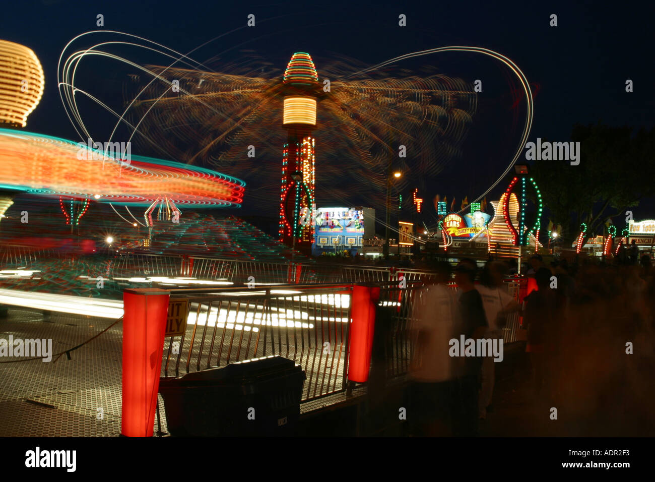 Hurricane Show Ride Carnival Rides Ride named Twister at near left Ride named Hurricane at ...