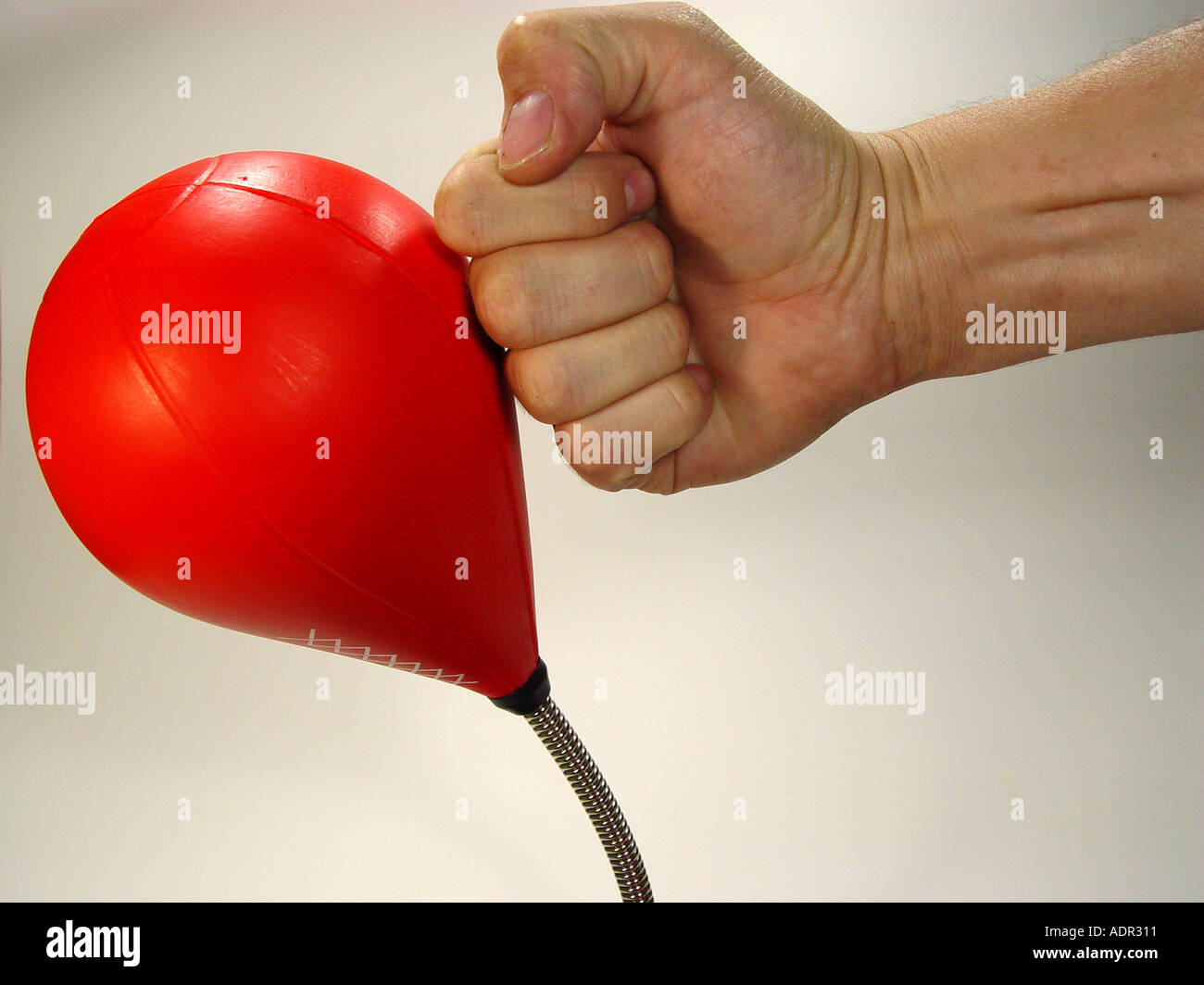 Punching ball as symbol for aggression dismantling force Mobbing etc Stock Photo
