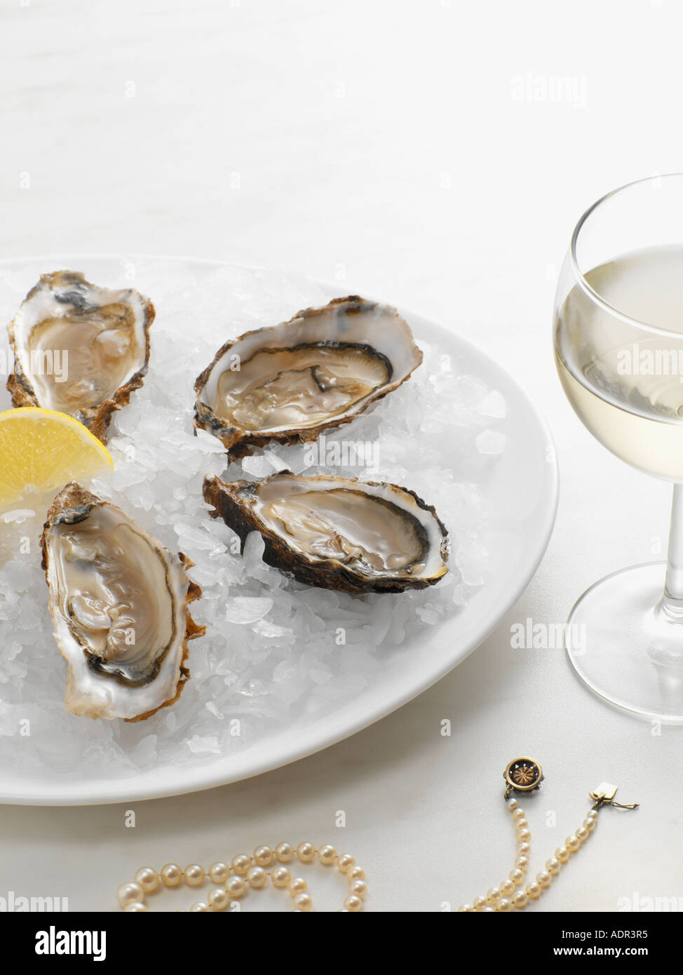 Oyster and pearls Stock Photo Alamy