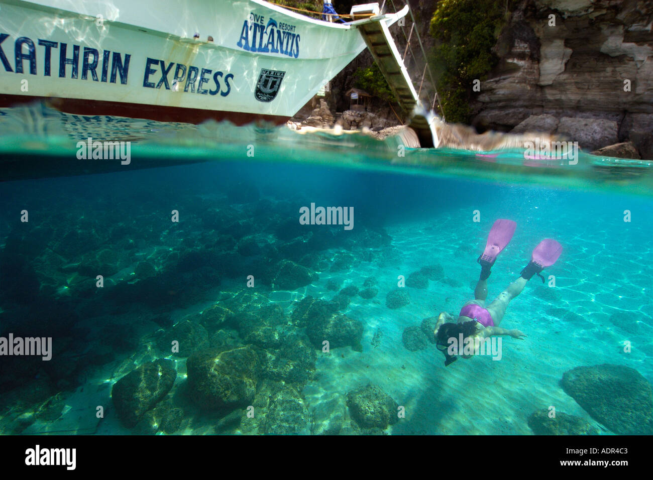 Snorkeller enjoys the underwater natural environment Apo island Marine Reserve Philippines Stock Photo