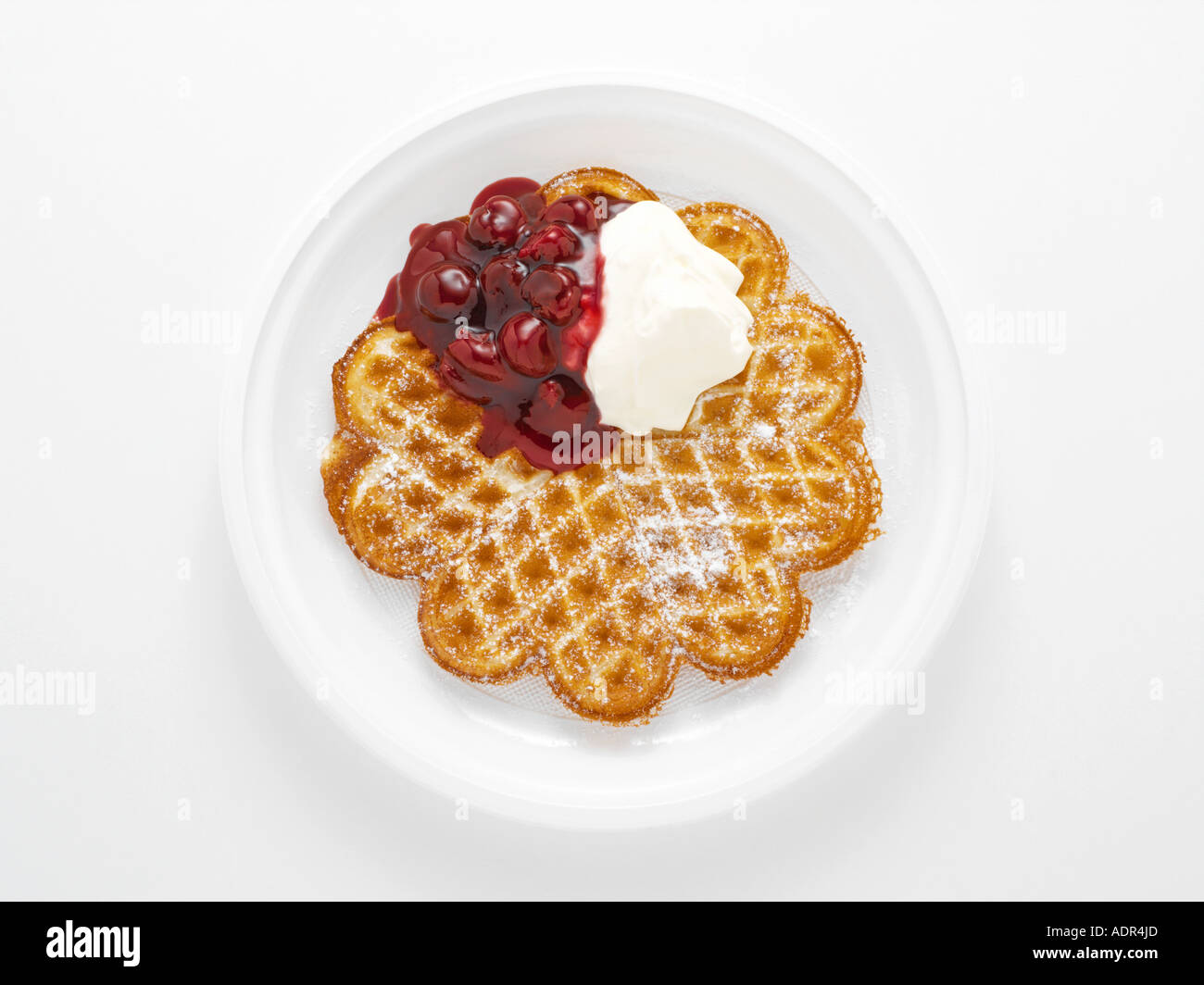 Waffle with cherries and cream Stock Photo