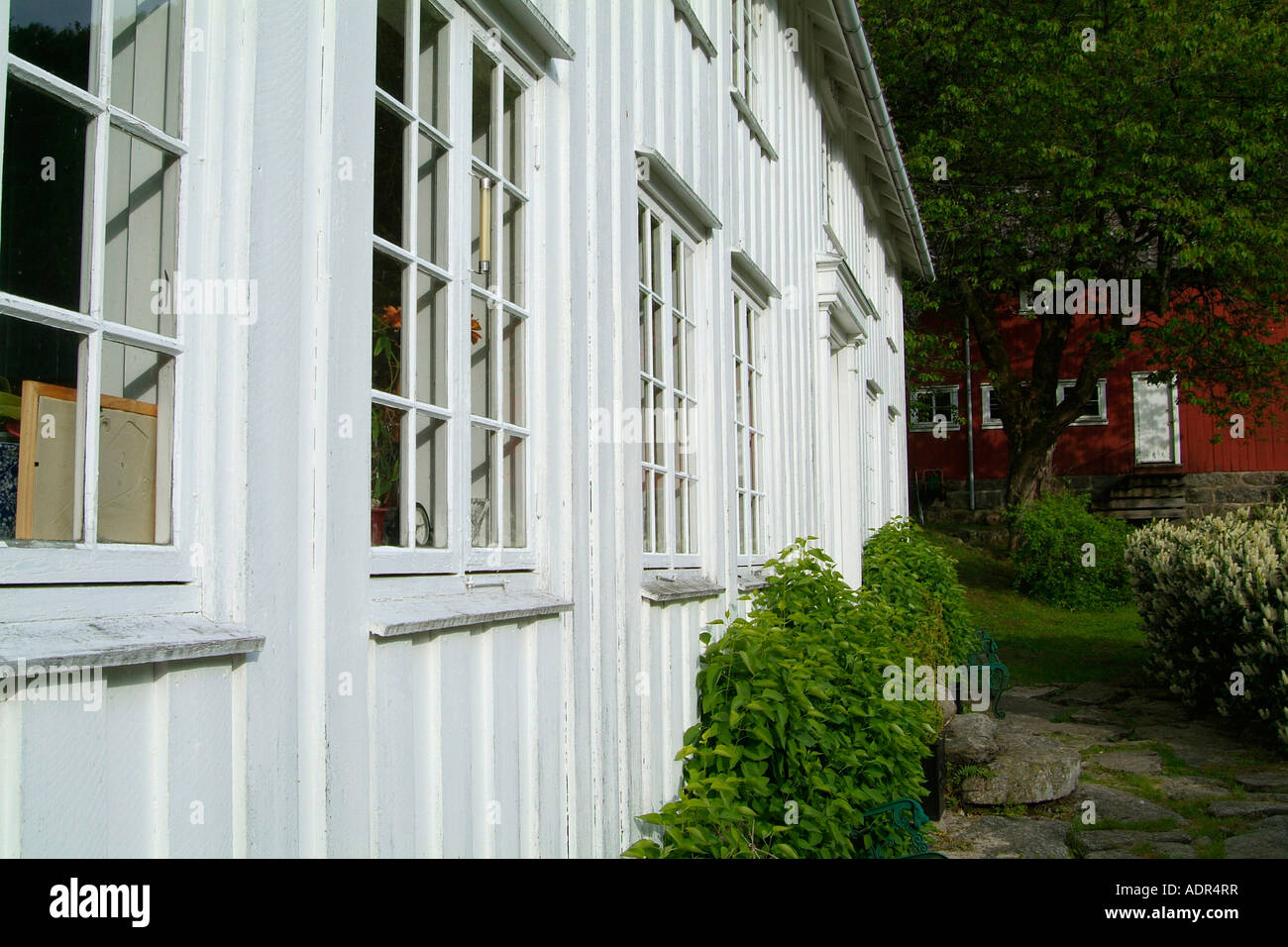 Facade of traditional old white wooden house Stock Photo - Alamy