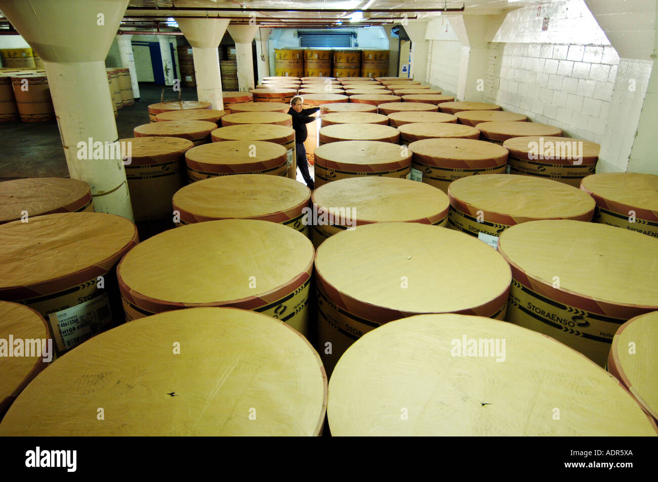 A newspaper printer with reels of newsprint paper which will be used