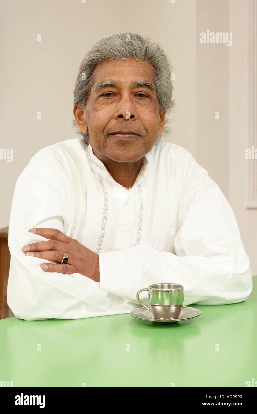 Senior man with a cup of tea Stock Photo Alamy