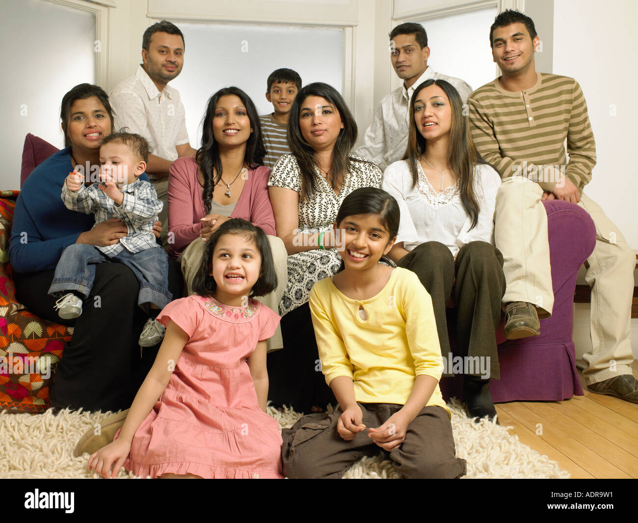 Large indian family in living room Stock Photo